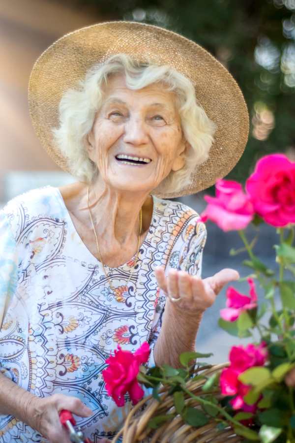 Resident gardening at Merrill Gardens at Ballard in Seattle, Washington